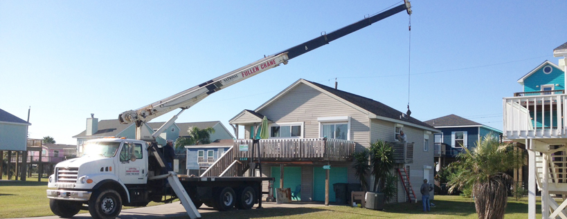 Crane installing new HVAC