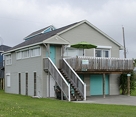 Photo Front of Mermaid Cove showing stairs going up